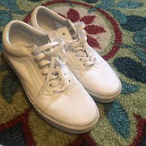All white low sk8 vans